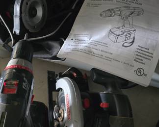 battery operated drill saw and charger with batteries 