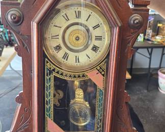 vintage clock with movement in nice condition with key