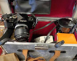 vintage cameras  cannon and extra lenses 