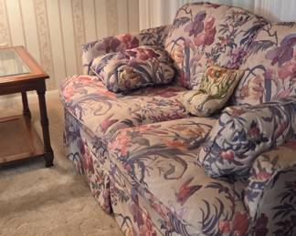 Floral print upholstered love seat