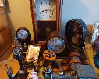Antique clocks, bells, toy train, more