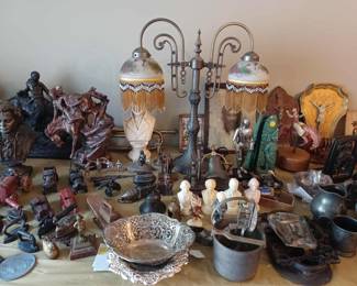 Antique cast iron figures and toys, lamps