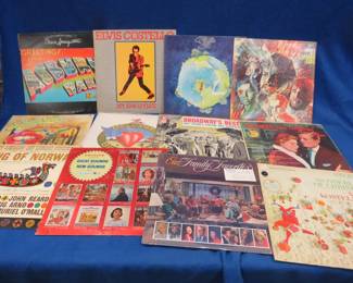 Lot 413. 12 LPs including Springsteen, Costello, The Eagles, Canned heat and more.