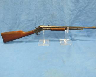 Lot 17. Stevens Model 70 Visible Loader .22 pump-action rifle. Ser. #W855. Shoots standard velocity S, L, and LR. Includes a case.