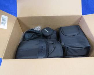 Lot 283. Camera cases, some from Nikon, and more