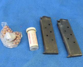 Lot 105. Remington 20-gauge? modified choke tube, two .22? magazines and some buckshot