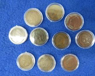 Lot 193. Ten Indian head pennies. See photos for dates listed by the seller