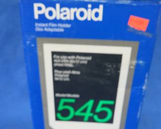 Lot 159. Polaroid Model: 545 film holder