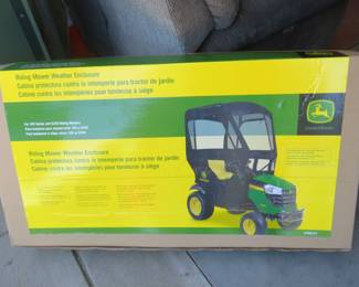 Lot 71. NIB John Deere riding mower Weather Enclosure model LP68121