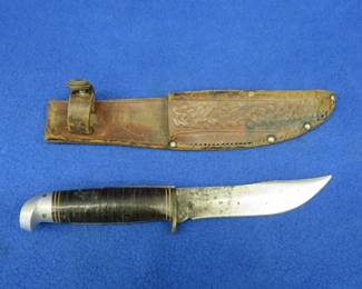 Lot 94. Vintage Western hunting knife with leather sheath