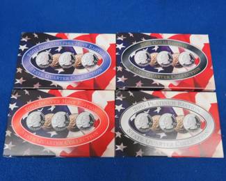 Lot 144. Four sets of 2005 State Quarters: Denver mint. Philadelphia mint. 24k gold layered. Platinum layered