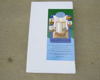 Lot 54. New-in-the-box Typhoon Rolling rack for fishing rods and tackle boxes