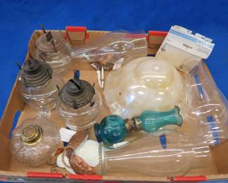 Lot 126. Oil lamp bases, globes, and more
