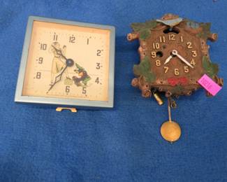 Lot 257. Two wind-up clocks for parts or repair. "Shoeshine clock" works sporadically.