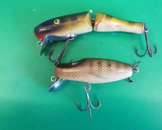 Lot 86. Vintage Paw Paw wooden 9100 with tack eyes, and a vintage Baby Pike Regular with tack eyes