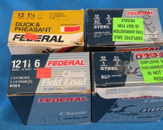 Lot 138. Four partial boxes of 12-gauge shotgun shells as shown in the photos