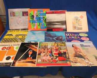 Lot 414. 12 LPs including Bob Marley, Men at Work, Rod Stewart, Traffic, Springsteen, Elvis Costello and more.