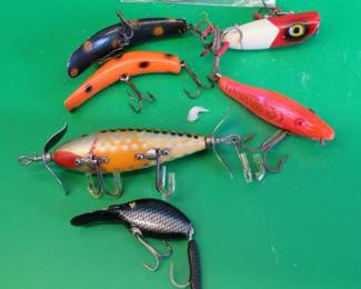 Lot 184. Bag O' Baits: Lazy Ike. Hellin Flatfish. Spin-Oreno Vintage South Bend.