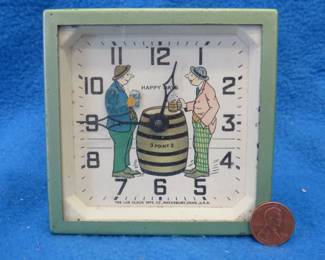Lot 14. Lux "Happy Days" beer drinking animated wind-up clock. Minute hand and animation work but hour hand is loose.
