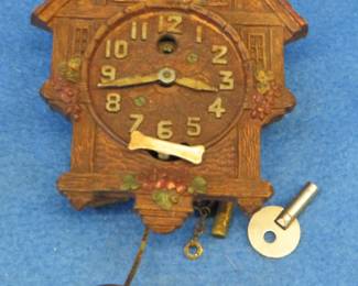 Lot 173. Vintage Keebler Bulldog with Bone pendulette clock with a key. Untested