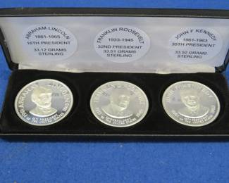 Lot 177. Three Sterling silver Presidential commemorative coins representing Lincoln, FDR, and JFK. 100.15 total grams of Sterling silver