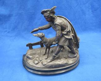 Lot 169. Bronze figurine of a man with a Greyhound, one dog is missing from the sculpture. (probably saw a squirrel)