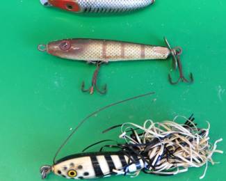 Lot 89. Fuelscha Bait Co. Shore Patrol, Heddon River Runt Spook Floater, and an Eger Bait Co. Dillinger 101.
