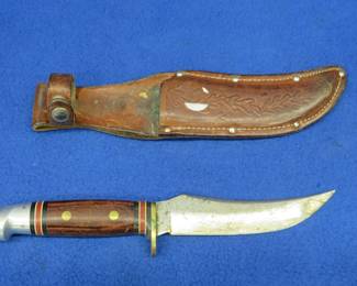 Lot 93. Vintage Western hunting knife with leather sheath