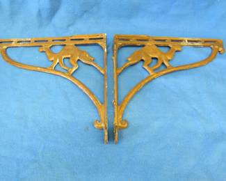 Lot 352. Vintage metal camel motif shelf brackets. Slight damage as pictured.