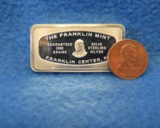 Lot 308. Franklin Mint Bank-marked sterling silver ingot. 65.3 grams.