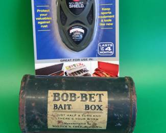 Lot 85. Bob-Bet bait box, and a NIP No Rust Shield tool