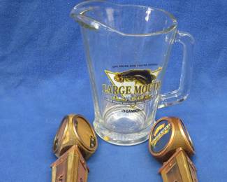 Lot 150. Large Mouth Lager pitcher and two Sierra tap handles