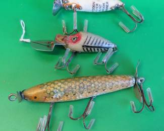 Lot 81. Vintage Jim Pfeffer wooden hand-painted minnow and two Heddon baits: Go-Deeper, and Spook Sinker River Runts