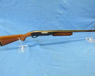 Lot 15. Remington 870 Wingmaster 12-gauge pump shotgun. Ser. #V986753. 2 3/4" chamber with a 28" vent rib barrel and a modified choke. Includes a case.