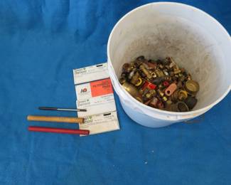Lot 301. About 15 lbs. of scrap including some brass, copper and steel. Also filters and a tap.