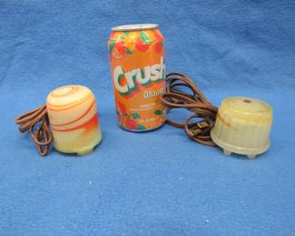 Lot 409. Two working Akro Agate cigarette/cigar lighters