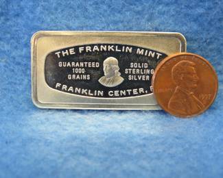 Lot 307. Franklin Mint Bank-marked sterling silver ingot. 65.5 grams.