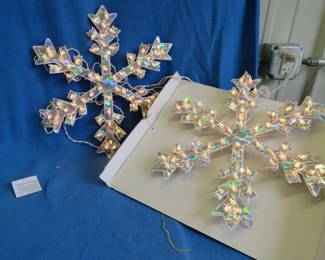 Lot 281. 2 lighted snowflakes.