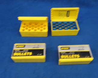 Lot 256. 100 Speer 50-cal bullets and two EMPTY plastic storage boxes
