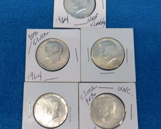 Lot 179. Five 1964 90% silver Kennedy half dollars