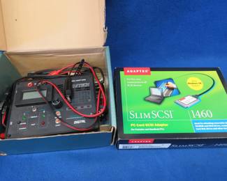 Lot 157. Pro-Tech Ni-Cad battery fast charger and a SCSI adapter