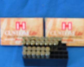Lot 101. 17 Hornady 30-06 rounds and some spent brass