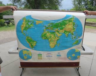 Lot 296. Vintage Cram's roll-up schoolhouse map depicting the World