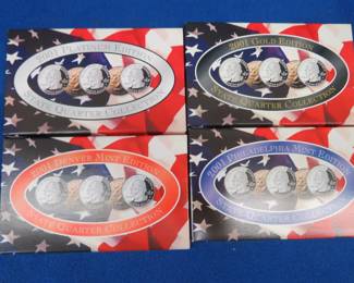 Lot 192. Four 2001 U.S. Mint State Quarter collection sets: P & D Mint set. Gold layered. Platinum layered.