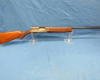 Lot 379. Browning A-5 semi-auto 12-gauge shotgun. Ser. #412458. 27.5" barrel with a 2 3/4" chamber. Some slight pitting on barrel and receiver.