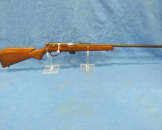 Lot 25. Marlin Model 80 .22 bolt-action rifle. NSN. Shoots S, L, and LR. Includes one magazine and a case.
