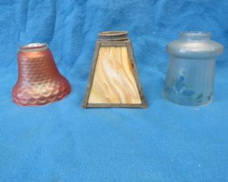 Lot 270. Three lampshades with 2 1/4" fitters. Caramel slag glass, marigold carnival glass, and a reverse painted.
