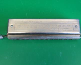 Lot 186. Hohner Chordomonica II double-sided chromatic harmonica with original leather pouch and wooden hinged box with a hasp. Sounds great.