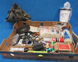 Lot 234. Camo hood, bike tube, mason's line, epoxy, and much more