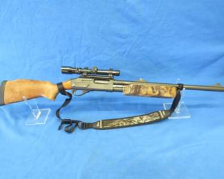 Lot 10. Remington Model 870 Express 12-gauge pump shotgun. SN B264375M. Smooth bore. Sling. Micro-Trac scope.